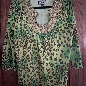 Gorgeous Cheetah 3/4 sleeve top with gold embellished details.  Size L